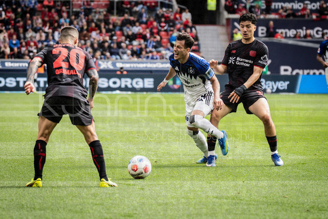 German Bundesliga, Bayer 04 Leverkusen vs. Hamburger SV, 16.05.2026 | LEVERKUSEN, GERMANY - MAY 16, 2026 :  Ibrahim Maza (Bayer 04 Leverkusen, 30) tackles Nicolas Capaldo (Hamburger SV, 24), on the left +l20 during the German Bundesliga match on gameday 34 between Bayer 04 Leverkusen vs. Hamburger SV at BayArena on May 16, 2026 in Leverkusen, Germany. DFL REGULATIONS PROHIBIT ANY USE OF PHOTOGRAPHS AS IMAGE SEQUENCES AND/OR QUASI-VIDEO.