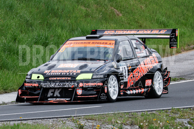 Rechberg Hill Climb 2025 – FIA European Hill Climb Championship | Rechberg Hill Climb 2025, part of the FIA European Hill Climb Championship. High-speed racing action, mountain scenery, atmosphere and pure motorsport passion captured in detail. The image shows Franz Kogler (AUT) Ford Escort Cosworth.          