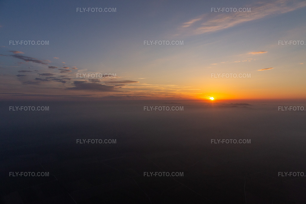 Aerial view: Sunset over the Northern Vosges and the Palatinate Forest in Wissembourg in the state Bas-Rhin, France. – Photo: IMG_144092.jpg taken on 11/09/2024 by Werner Riehm/FLY-FOTO.com – Resolution of the original: 5472 x 3648 px