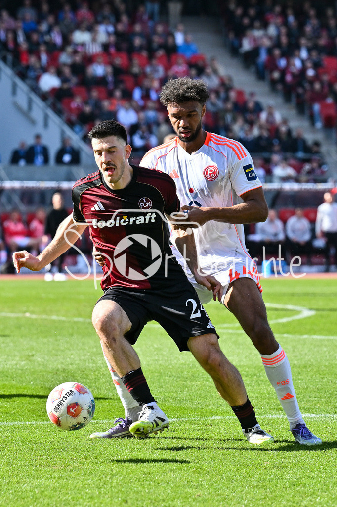 1. FC Nürnberg - Fortuna Düsseldorf | NUREMBERG, GERMANY - 07. MARCH:  im Duell Elias EGOULI (Fortuna Düsseldorf 44) und Luka LOCHOSHVILI (1. FC Nuernberg 24) während dem Match zwischen dem 1. FC Nürnberg und Fortuna Düsseldorf am 25. Spieltag der 2. Bundesliga im Max Morlock Stadion / DFL REGULATIONS PROHIBIT ANY USE OF PHOTOGRAPHS AS IMAGE SEQUENCES AND/OR QUASI-VIDEO