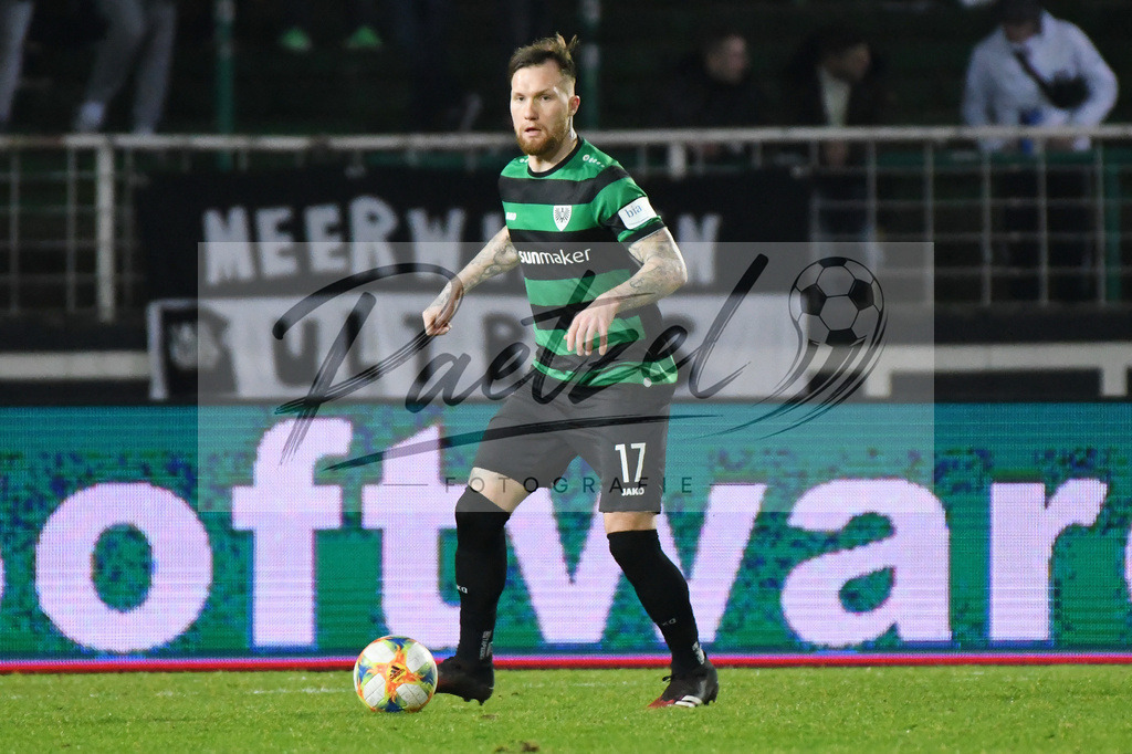 20200214_SCPFWK_0046 | Fussball, Herren: Jan Loehmannsroeben (SC Preussen Muenster) in Aktion, am Ball, Einzelaktion waehrend des Spiels der 3. Liga zwischen SC Preussen Muenster und FC Wuerzburger Kickers im Preussenstadion am 14.02.2020 in Muenster, Deutschland.DFB / DFL REGULATIONS PROHIBIT ANY USE OF PHOTOGRAPHS AS IMAGE SEQUENCES AND/OR QUASI-VIDEO. - Realisiert mit Pictrs.com