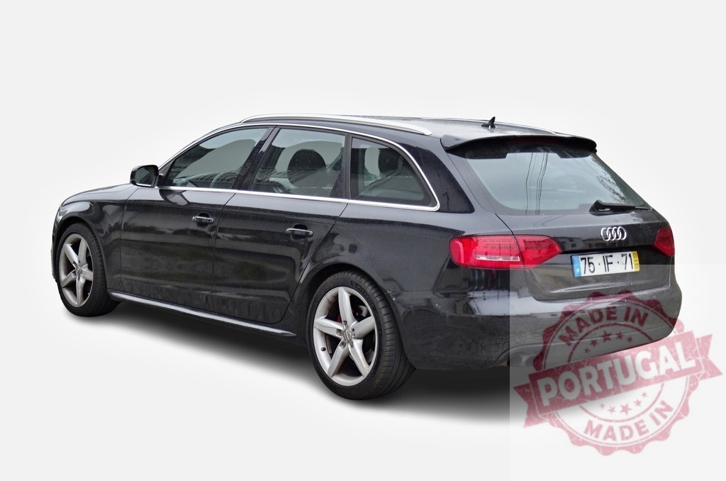 Black Audi A4 Avant is parked on white background | Studio shot of a black Audi A4 Avant from the rear, showcasing its sleek design - Realisiert mit Pictrs.com