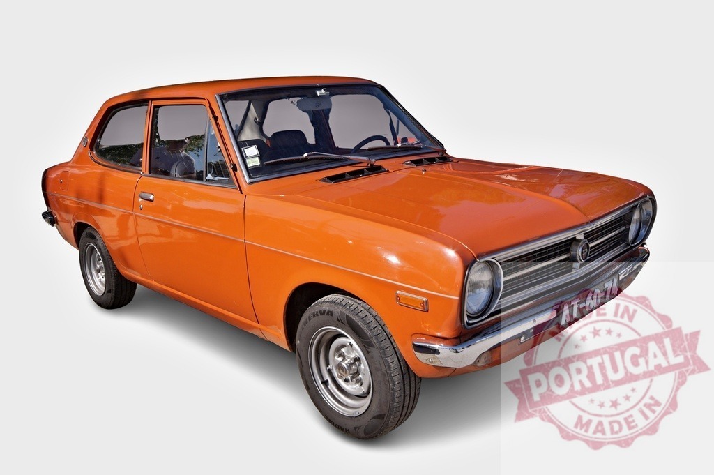 Orange Datsun 1200 classic Japanese coupe on white | Orange Datsun 1200 B110 classic car for vintage and retro transportation concepts - Realized with Pictrs.com
