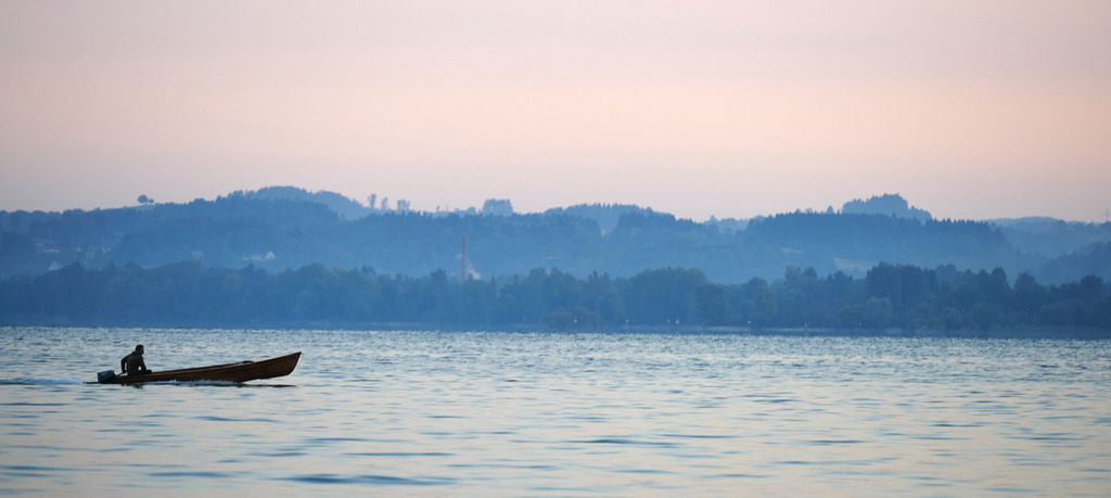 Fischer faehrt auf die See | Bregenz, Austria - September 10, 2015: Fischer faehrt auf die See. - Realisiert mit Pictrs.com