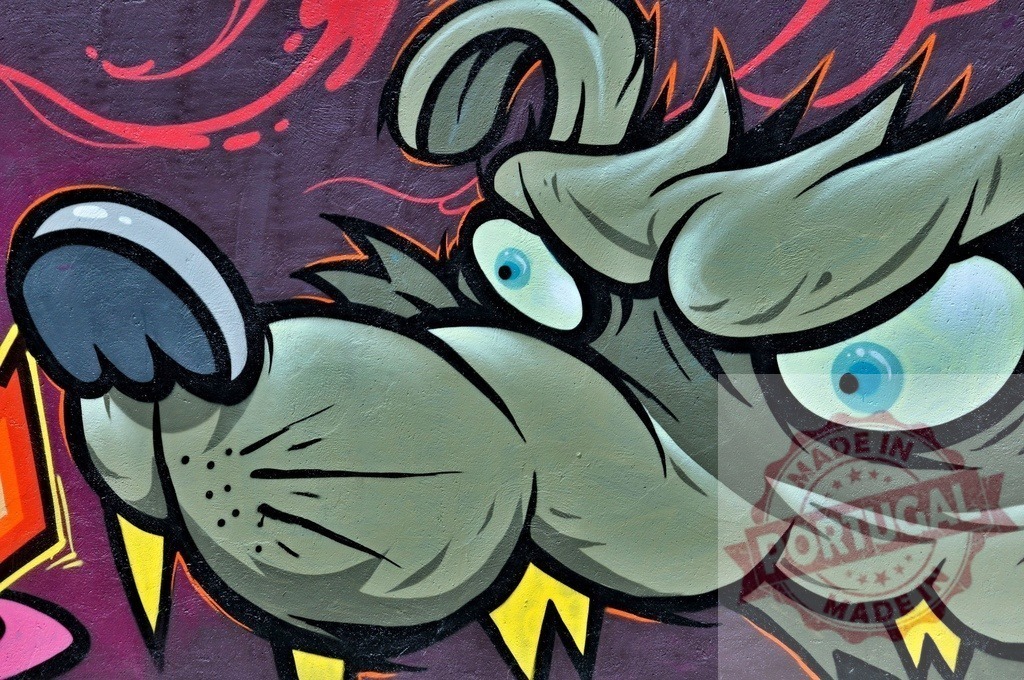 Menacing wolf face staring with blue eyes in graffiti art | Colorful graffiti art of a menacing wolf face staring with bright blue eyes on a textured wall - Realized with Pictrs.com