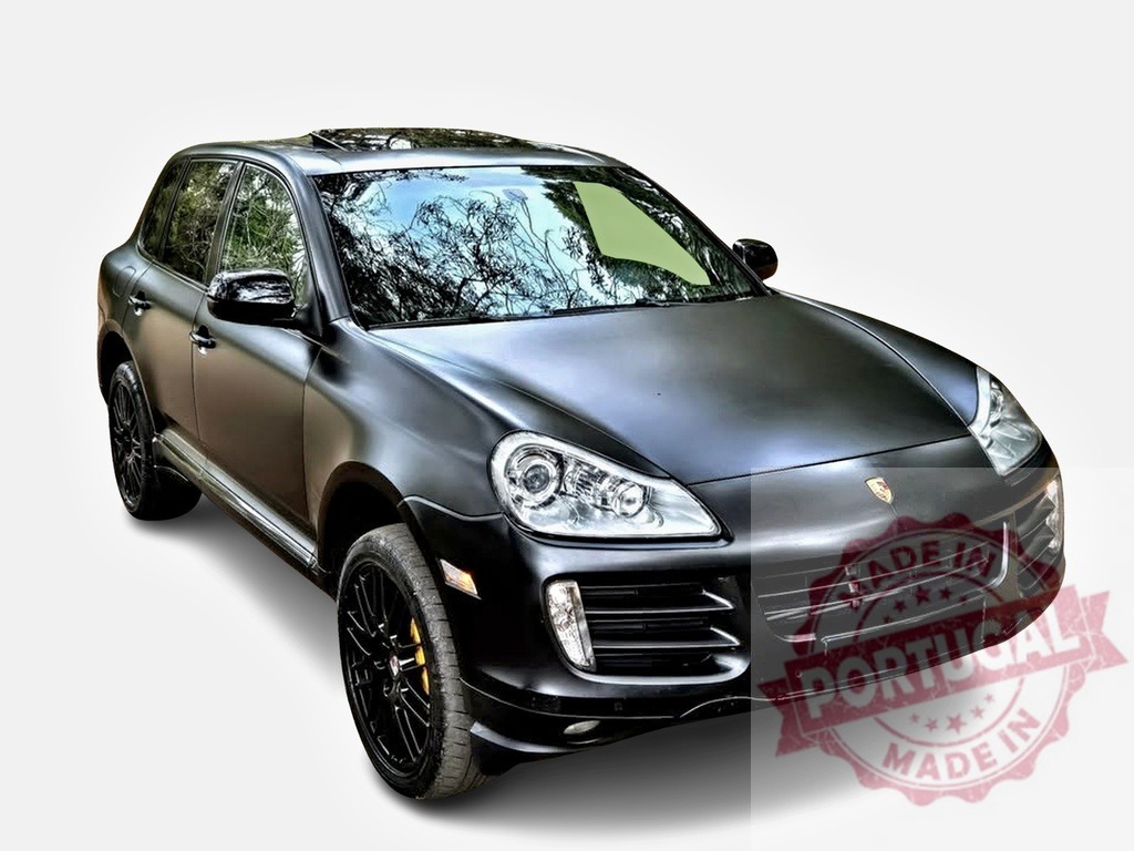 Matte black Porsche Cayenne SUV on white background | Black matte Porsche Cayenne luxury SUV parked, showcasing automotive design and transportation - Realized with Pictrs.com