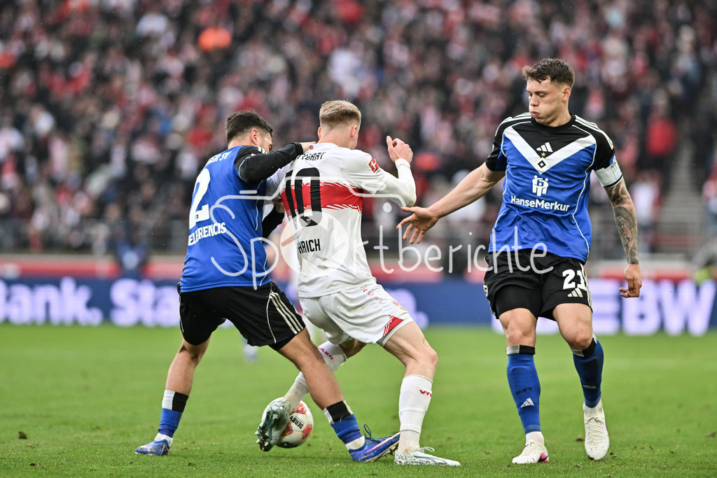 VfB Stuttgart - Hamburger SV | STUTTGART, GERMANY - 12. APRIL: tackle between William MIKELBRENCIS (Hamburger SV 2) and Chris FÜHRICH (VfB Stuttgart 10) and Nicolai REMBERG (Hamburger SV 21) during the Bundesliga Match between VfB Stuttgart vs. Hamburger SV on Matchday 29 at MHP Arena / DFL REGULATIONS PROHIBIT ANY USE OF PHOTOGRAPHS AS IMAGE SEQUENCES AND/OR QUASI-VIDEO