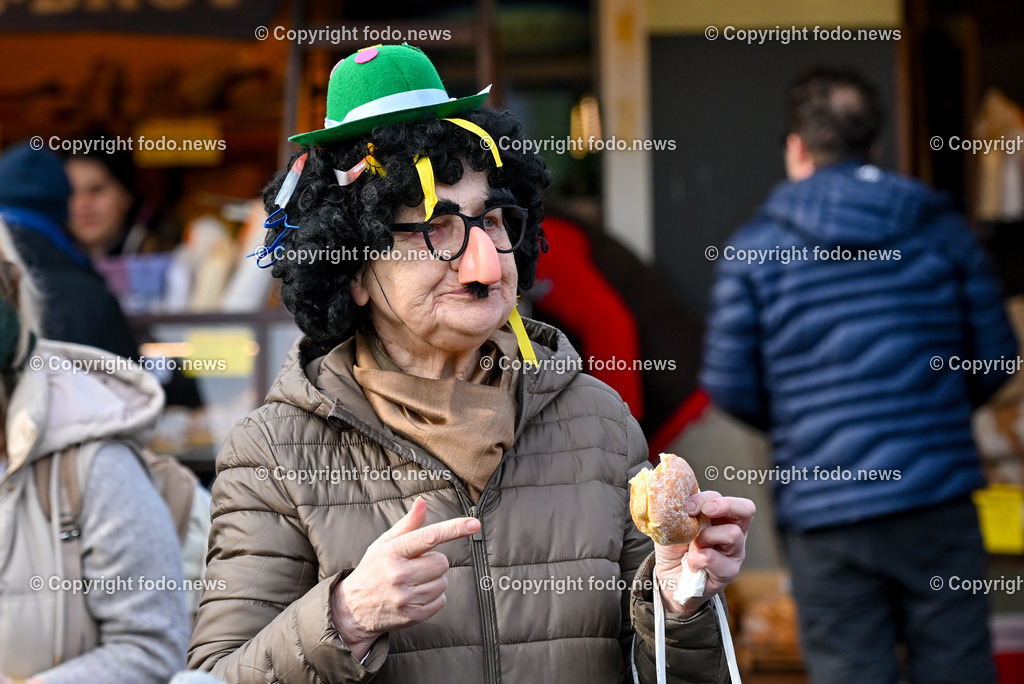 Suedbahnhofmarkt Linz_ Faschingsumzug 2024_ 10.02.2024-25 | 10.02.2024, Linz, AUT, Suedbahnhofmarkt, Faschingsumzug 2024, im Bild Ebelsberger Faschingsgilde, Umzug, Musik, Masken, maskiert, Krapfen, Verkleidungen, Prinzenpaar
