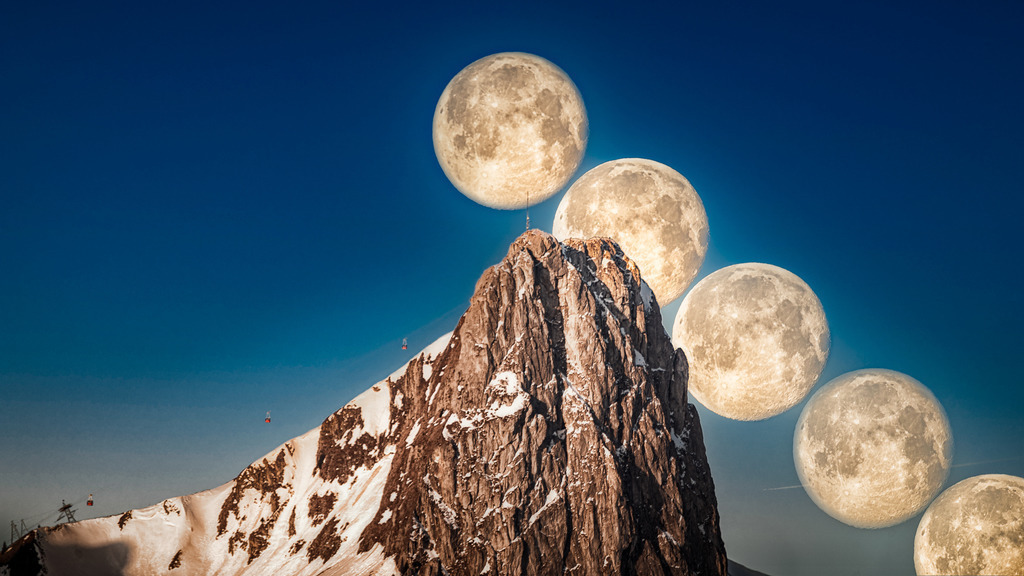 Mondserie am Stockhorn | Monduntergang am Stockhorn. Montage von 6 Fotos (von ca. 140 - siehe Zeitraffer Der Film zum Bild: https://www.hess.photography/Public/i-Q5sZ8Lf) 
Da gleichzeitig die Seilbahn von der Berg- zur Mittelstation schwebte, habe ich sie auch in mehrfacher Ausführung drapiert. 
Da ich mich für die beste Aufnahme position immer weiter nach Südosten verschieben musste, war ich etwas spät dran. Gerne hätte ich am oberen Rand einen Mond mehr. 
------------------------------------------------------------
Moonset on the Stockhorn. Montage of 6 photos (of approx. 140 - see time lapse of the film for the picture: https://www.hess.photography/Public/i-Q5sZ8Lf)
Since the cable car was floating from the mountain station to the middle station at the same time, I also draped it in multiple versions.
Since I had to move further and further to the southeast for the best exposure position, I was a little late. I would like to have one more moon at the top.
------------------------------------------------------------
Dieser Druck ist in einer limitierten Auflage von 5 Exemplaren erhältlich. 
This print is available in a limited edition of 5 copies. 
http://art.hess.photography/107-mondserie-am-stockhorn.html - Realisiert mit Pictrs.com