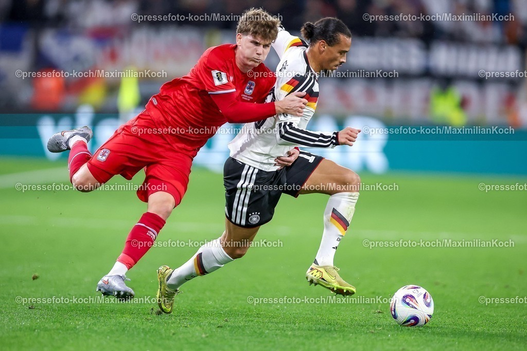 DFB14112501094 | 14.11.2025, Fußball, Länderspiel, WM-Qualifikation Europa, Deutschland - Luxemburg, Stade de Luxembourg (Croix de Gasperich, Luxemburg), 9. Spieltag, Saison 2025 2026: Florian Bohnert (LUX #04) im Zweikampf gegen  Leroy Sane (GER #19)  Regulations prohibit any use of photographs as image sequences and or quasi-video.