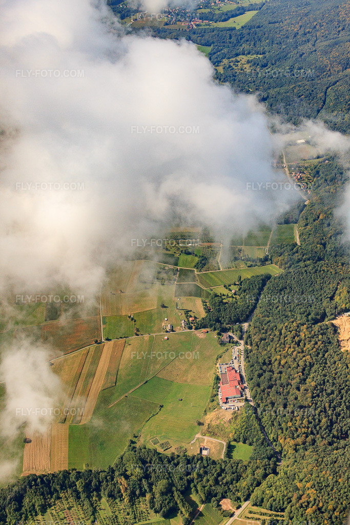 Aerial view: Cleebourg winegrowers' cooperative under clouds in Rott in the state Bas-Rhin, France.Photo: IMG_21015.jpg taken on 09/06/2009 by Werner Riehm/FLY-FOTO.comResolution of the original: 3168 x 4752 px