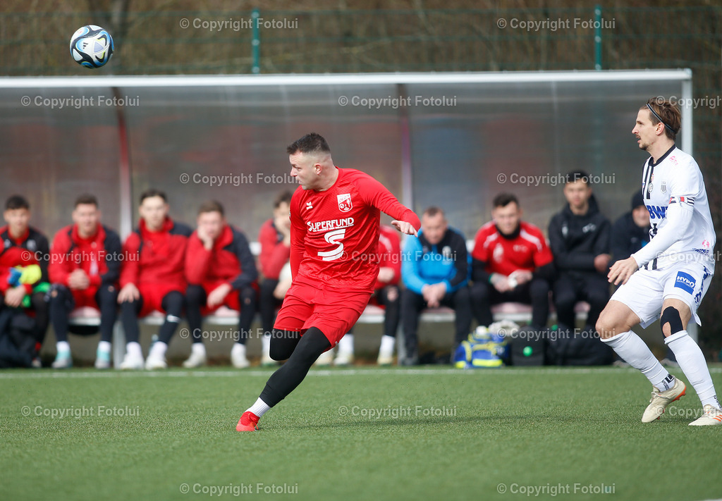 A_LUI_100224_22 | SPORT,FUSSBALL,TESTSPIEL ASKOE OEDT-SPG LASK AMATUERE 10.02.2024 IM BILD: NENAD VIDACKOVIC (OEDT) UND SEBASTIAN WIMMER (SPG LASK) FOTO:FOTOLUI