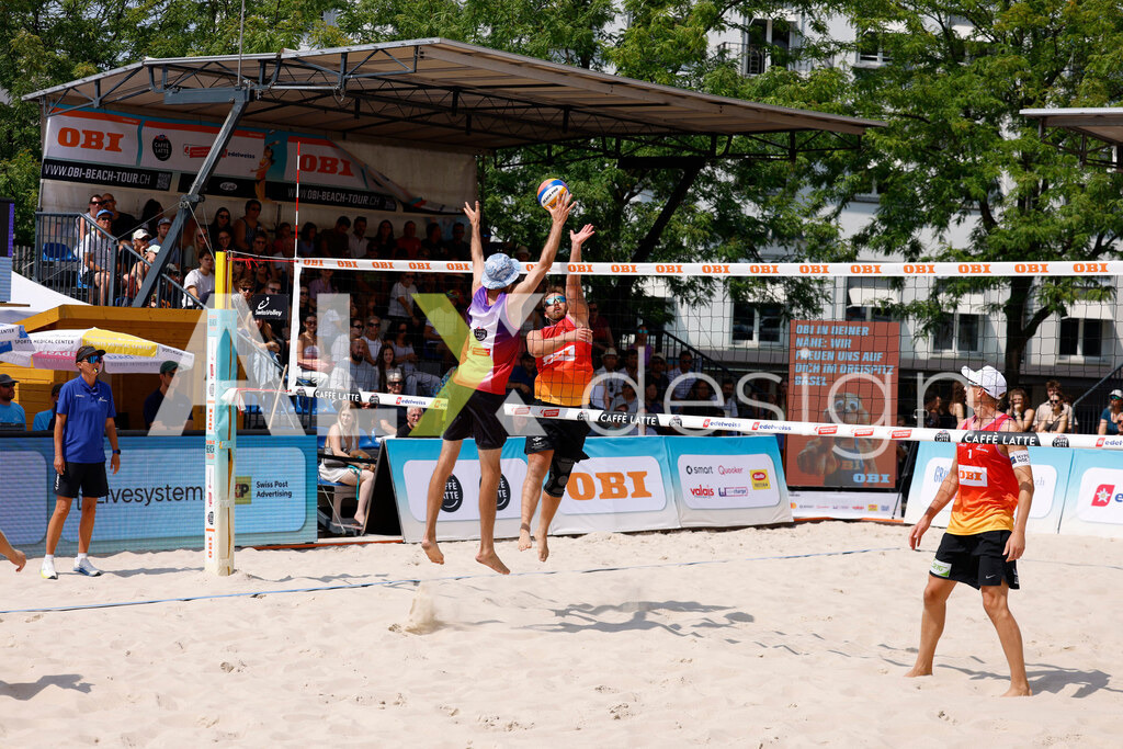 Obi BeachTour 2026 - Basel | BASEL, SWITZERLAND - JULY 19: MORITZ KINDL (AUT) attack / spike during the Obi BeachTour 2026 match between HAGENBUCH / HAUSSENER (SUI) and LEITNER / KINDL (AUT) at Barfüsserplatz on July 19, 2026 in Basel, Switzerland. - Realisiert mit Pictrs.com