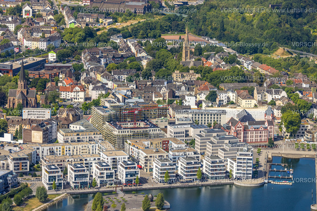 Dortmund220704676 | Luftbild, Phoenix-See, Geschäftsgebäude am Hafen, links kath. Kirche St. Clara, rechts evang. Lutherkirche, Hörde, Dortmund, Ruhrgebiet, Nordrhein-Westfalen, Deutschland