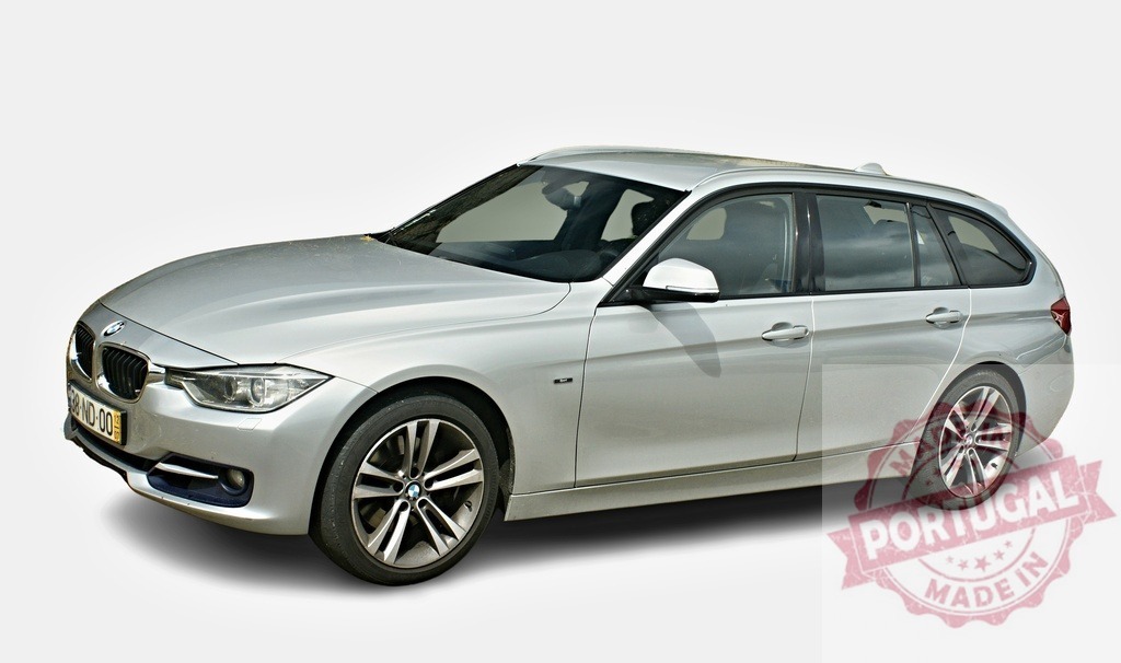 Silver BMW 3 Series Touring parked on white background | Modern silver BMW 3 Series station wagon isolated on white background - Realized with Pictrs.com