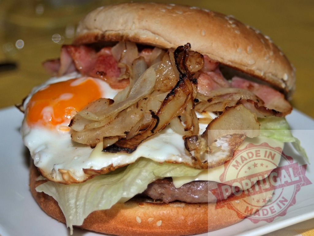 Gourmet bacon cheeseburger with fried egg and caramelized onions | Classic cheeseburger with bacon, fried egg, caramelized onions, lettuce, and bun - Realized with Pictrs.com