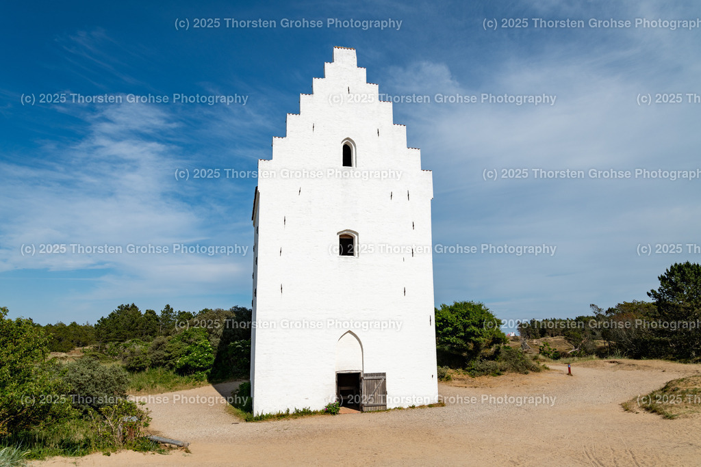 Sanded Church (den tilsandede kirke) Skagen North Jutland, Denmark, 2023, Versandete Kirche (den tilsandede kirke) Skagen Nordjütland, Dänemark, 2023 | The sanded church of St. Laurentius (Danish: den tilsandede kirke) is a popular attraction southwest of Skagen in North Jutland. Die verssandete Kirche St. Laurentius (dänisch: den tilsandede kirke) ist eine beliebte Sehenswürdigkeit südwestlich von Skagen in Nordjütland. - Realisiert mit Pictrs.com