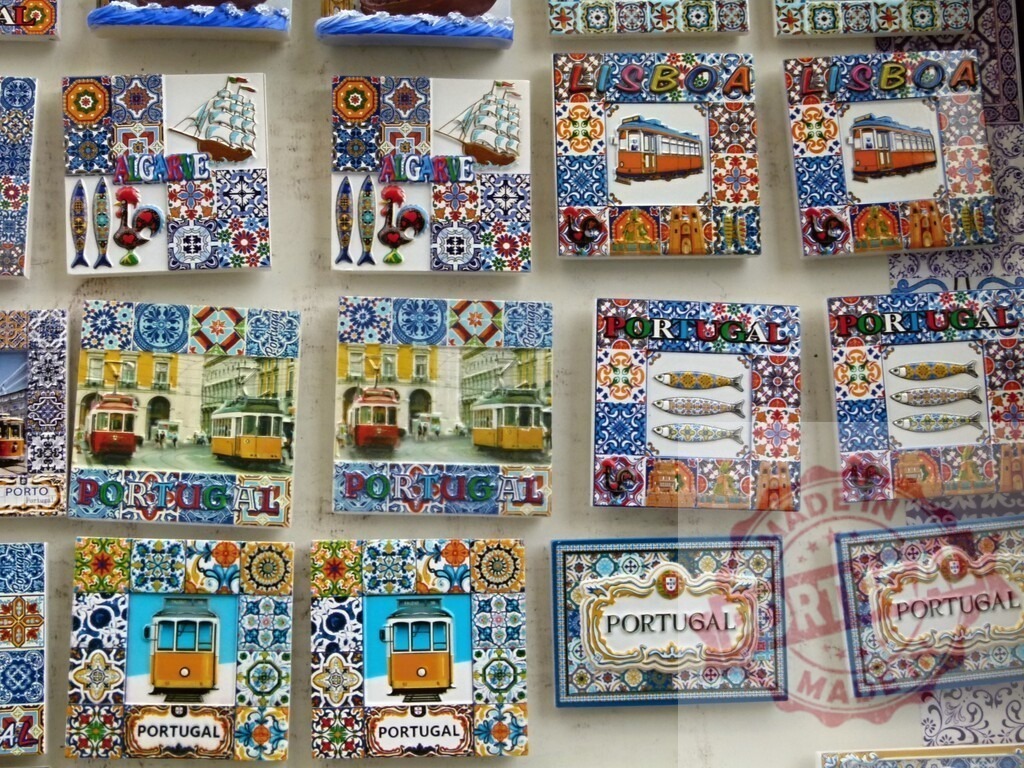 Portugal souvenirs and azulejos magnets for sale | Collection of Portuguese themed magnets, featuring azulejos, trams, sardines, and roosters - Realized with Pictrs.com