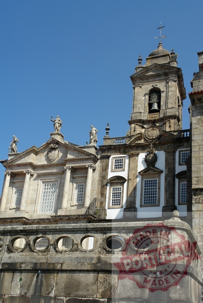 Igreja da Misericórdia church tower and facade Braga Portugal. Porto - Portugal | Igreja da Misericórdia in Braga, Portugal, showcasing baroque architecture and a bell tower against a blue sky - Realized with Pictrs.com