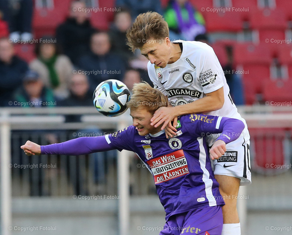 A_LUI_121123_14 | SPORT,FUSSBALL,ADMIRAL BUNDESLIGA AUSTRIA KLAGENFURT-STURM GRAZ 12.11.2023
IM BILD: DAVID AFFENGRUBER (STURM GRAZ ) UND JONAS ARWEILER  (KLAGENGURT)FOTO: FOTOLUI