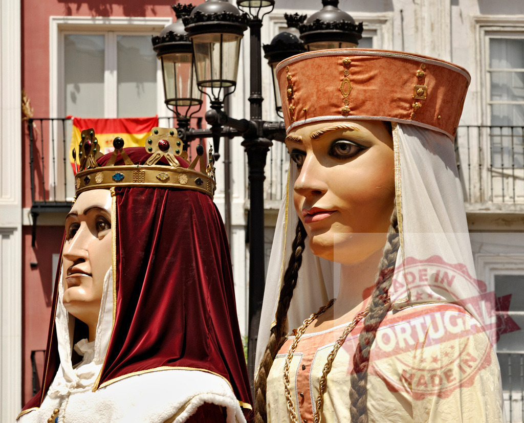 Spanish gigantones queen and lady at cultural festival. Spain - Burgos | Gigantes y cabezudos figures celebrating a traditional festival in Spain - Realized with Pictrs.com