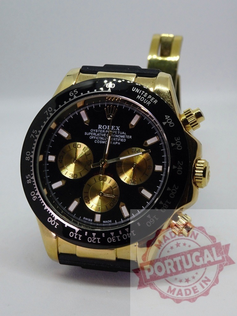 Rolex Daytona gold chronograph luxury wristwatch on white | Rolex Daytona gold chronograph wristwatch displaying wealth and precision on white background - Realized with Pictrs.com