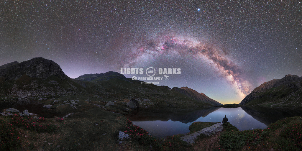 Refelecting Beauty | High up in the Austrian Alps with little Lightpolution one can enjoy the night sky to it`s fullest. 360 degree Milky Way pano with a mountain lake, reflection of the stars and flowers - Realisiert mit Pictrs.com