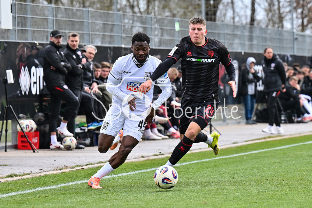 FC Ingolstadt - SSV Ulm 1846 Fussball  | INGOLSTADT, GERMANY - 25. MAERZ: im Duell Streli MAMBA (SSV Ulm 45) und Gustav CHRISTENSEN (FC Ingolstadt 24) während dem Testspiel zwischen dem FC Ingolstadt und dem SSV Ulm 1846 Fussball auf Platz 4 am Audi Sportpark