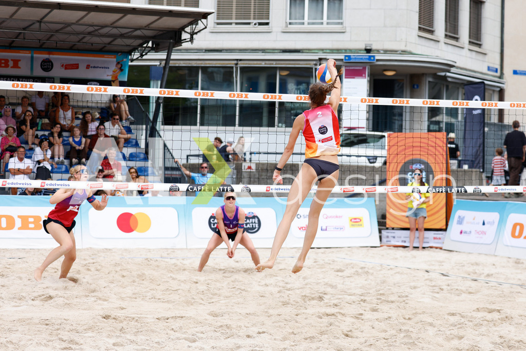 Obi BeachTour 2026 - Basel | BASEL, SWITZERLAND - JULY 17: NADINE DEMIERRE (SUI) attack / spike during the Obi BeachTour 2026 match between FLÜCKIGER / DEMIERRE (SUI) and EUGSTER / GÄHWILER (SUI) at Barfüsserplatz on July 17, 2026 in Basel, Switzerland. - Realisiert mit Pictrs.com