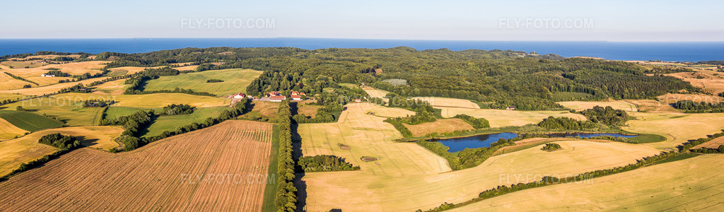 Aerial view: Panorama Klintholm Møn, Klintholm Gods in Borre in the state Zealand, Denmark. – Photo: IMG_108524-Pano.jpg taken on 07/04/2018 by Werner Riehm/FLY-FOTO.com – Resolution of the original: 11392 x 3336 px