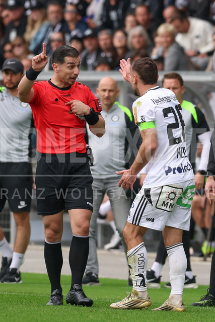 SK Puntigamer Sturm Graz vs TSV Egger Glas Hartberg – Championship Group    | Graz, Austria, 12.Apr.26 - SOCCER - ADMIRAL Bundesliga, SK Puntigamer Sturm Graz vs TSV Egger Glas Hartberg. The image shows Juergen Heil (Hartberg) have a discussion with the referee.    