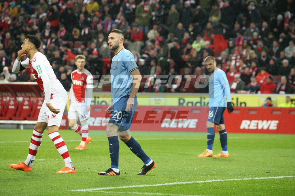 1. FC Köln - VFL Bochum | V. l.: Davie Selke, Florian Kainz (Hintergrund), Ivan Ordets und Konstantinos Stafylidis -  © Sportfoto-Sale (MK) - Realisiert mit Pictrs.com