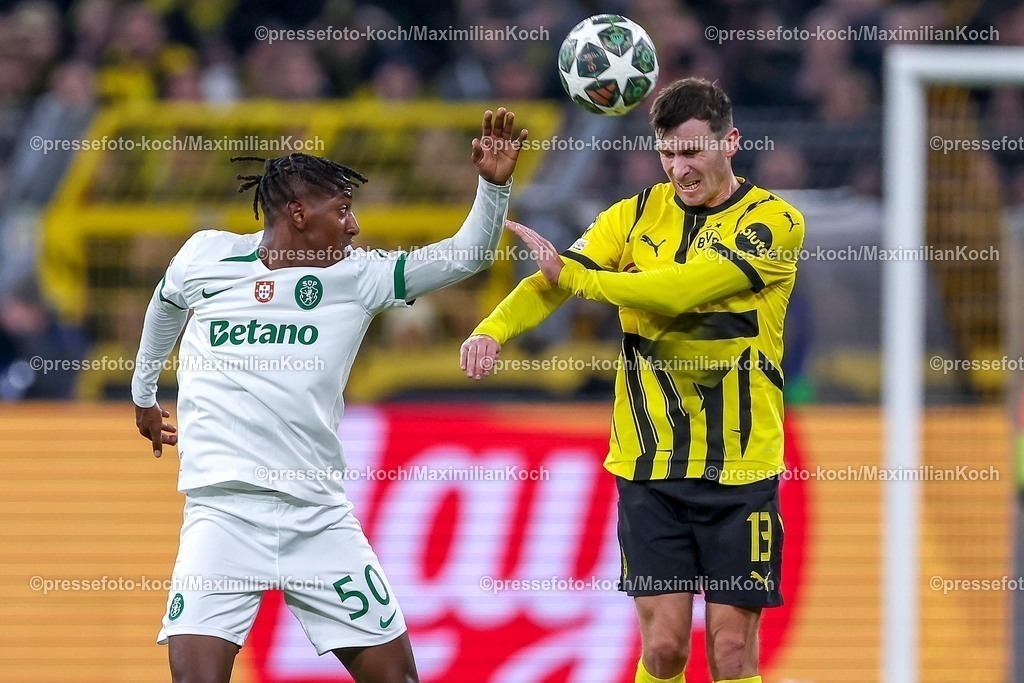 UCL1902250101045 | 19.02.2025, Fußball, UEFA Champions League, Borussia Dortmund - Sporting Lissabon, Signal Iduna Park, Knockout phase play-offs, Saison 2024 2025: Alexandre Brito  (Sporting #50) im Zweikampf gegen Pascal Groß (BVB #13)