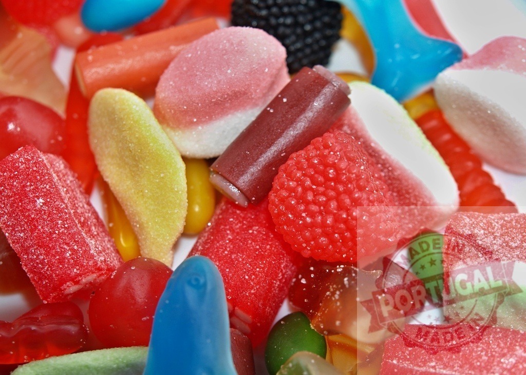 Colorful mix of gummy candies and sweet treats | Assortment of vibrant gummy candies offering a variety of shapes and textures - Realized with Pictrs.com