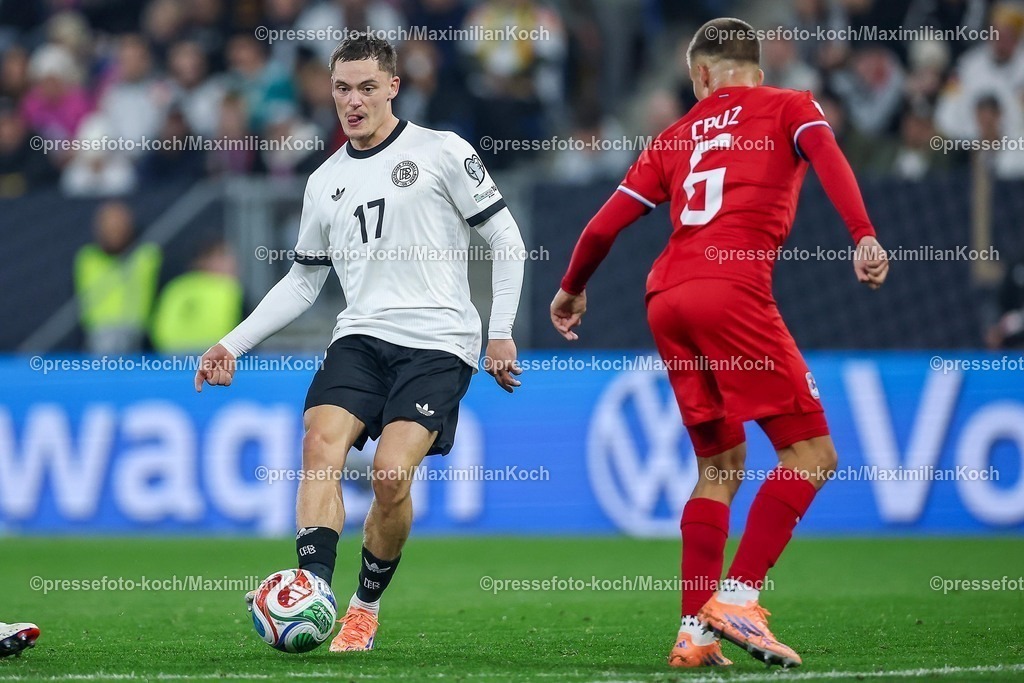 DFB10102502192 | 10.10.2025, Fußball, Länderspiel, Deutschland - Luxemburg, UEFA WM-Qualifikation, 2025/2026, Gruppe A, PreZero Arena in Sinsheim: Florian Wirtz (GER #17) gegen Tomas Moreira (LUX #06) DFB regulations prohibit any use of photographs as image sequences and or quasi-video.