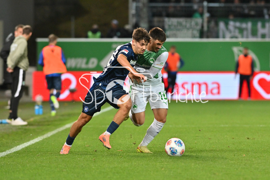 SpVgg Greuther Fürth - Karlsruher SC | FUERTH, GERMANY - OCTOBER 24: Rafael PINTO PEDROSA (Karlsruher SC 36) against Aaron KELLER (SpVgg Greuther Fuerth 16) during the 2. bundesliga match between SpVgg Greuther Fuerth vs. Karlsruher SC on matchday 10 at Sportpark Ronhof Thomas Sommer on October 24, 2025 in Fuerth, Germany / DFL REGULATIONS PROHIBIT ANY USE OF PHOTOGRAPHS AS IMAGE SEQUENCES AND/OR QUASI-VIDEO