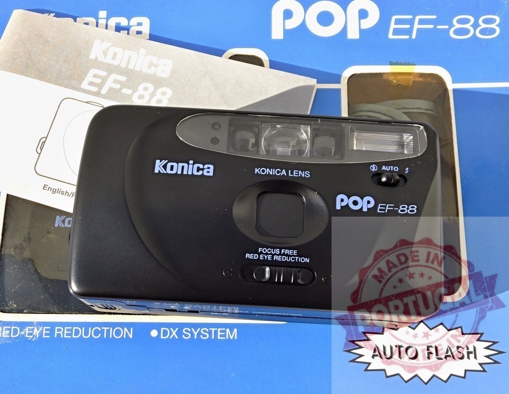 Konica POP EF-88 35mm point and shoot film camera | Konica POP EF-88 35mm point and shoot camera with its manual and packaging - Realized with Pictrs.com