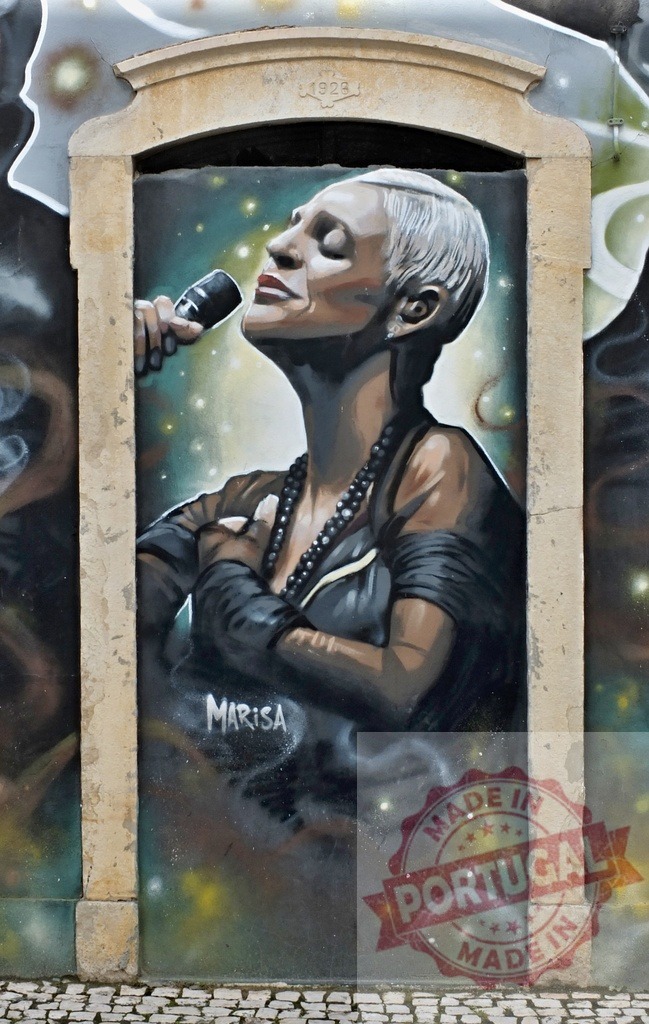 Marisa fado singer graffiti mural street art in Portugal | Marisa fado singer portrait painted as street art in Lisbon, Portugal - Realized with Pictrs.com