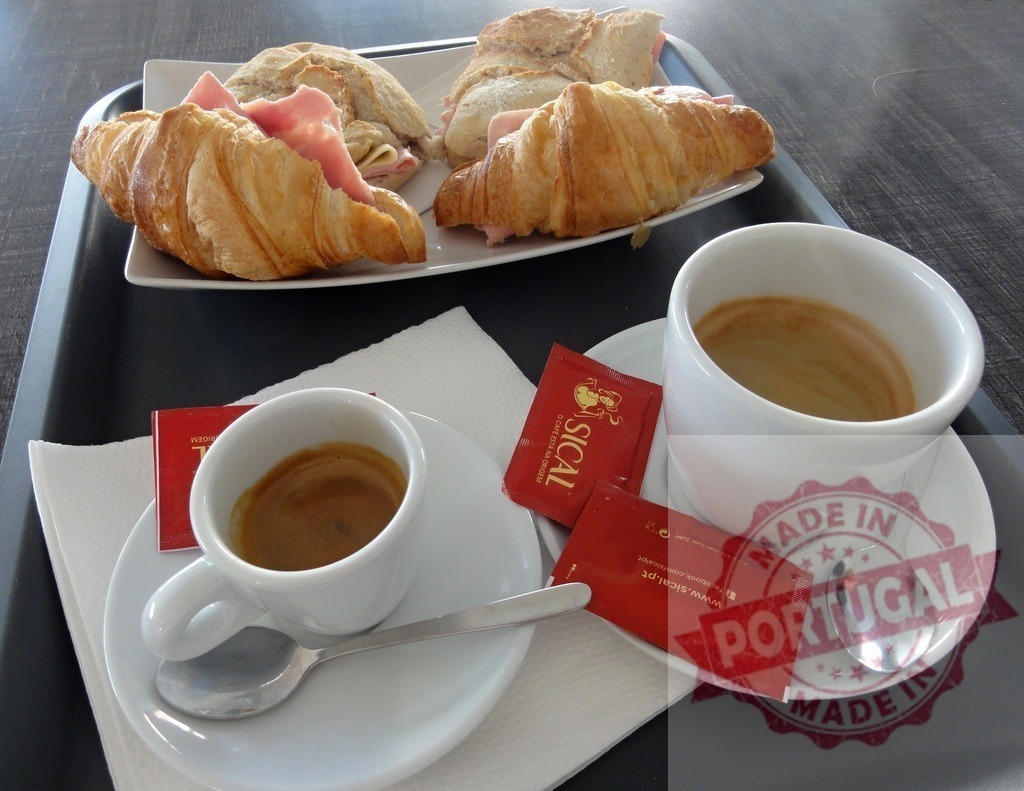 Portuguese breakfast with Sical espresso and ham croissants | Tray with espresso coffee, ham croissants and sandwiches for a typical Portuguese breakfast - Realized with Pictrs.com
