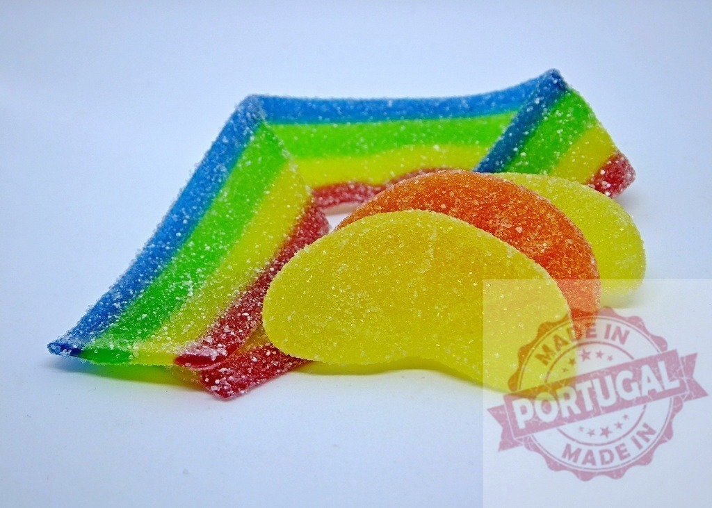 Colorful gummies sugar candy mix on white background | Bright sugar-coated gummy candies offering a sweet and sour taste sensation - Realized with Pictrs.com