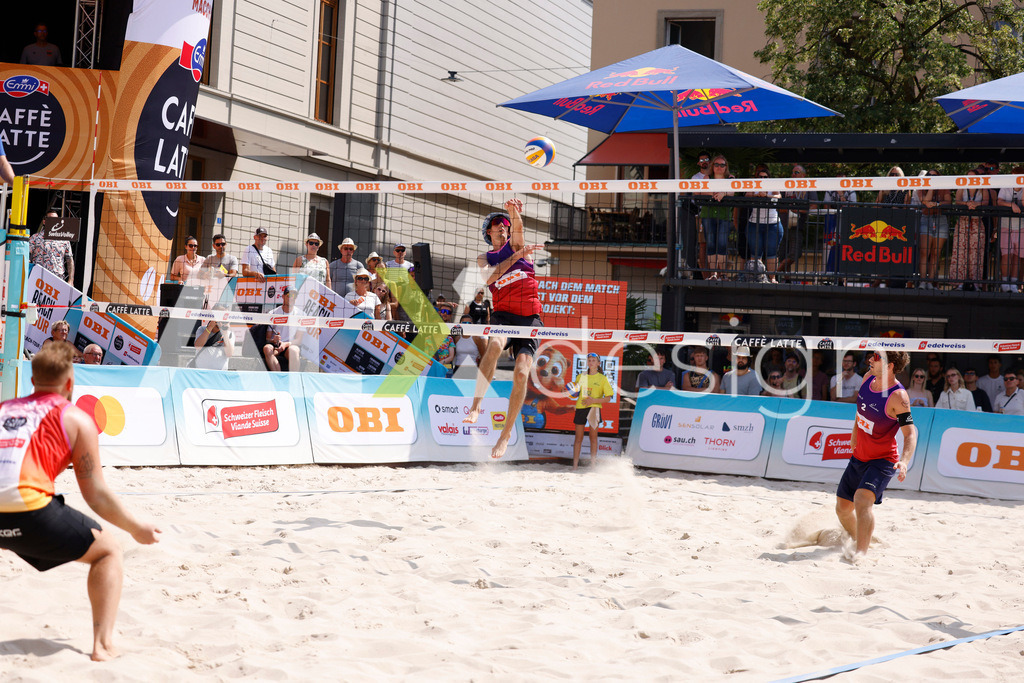 Obi BeachTour 2026 - Basel | BASEL, SWITZERLAND - JULY 19: SIMON HAGENBUCH (SUI) attack / spike during the Obi BeachTour 2026 match between HAGENBUCH / HAUSSENER (SUI) and LEITNER / KINDL (AUT) at Barfüsserplatz on July 19, 2026 in Basel, Switzerland. - Realisiert mit Pictrs.com