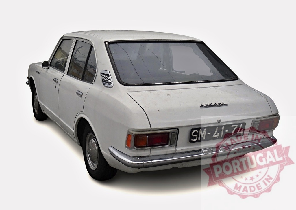White Toyota Corolla parked showing rear end | Classic white Toyota Corolla parked on white background, showing rear end - Realized with Pictrs.com