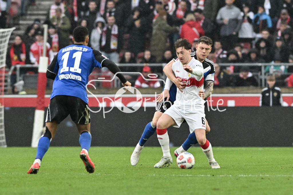 VfB Stuttgart - Hamburger SV | STUTTGART, GERMANY - 12. APRIL: tackle betwwen Nicolai REMBERG (Hamburger SV 21) and Angelo STILLER (VfB Stuttgart 6) during the Bundesliga Match between VfB Stuttgart vs. Hamburger SV on Matchday 29 at MHP Arena / DFL REGULATIONS PROHIBIT ANY USE OF PHOTOGRAPHS AS IMAGE SEQUENCES AND/OR QUASI-VIDEO