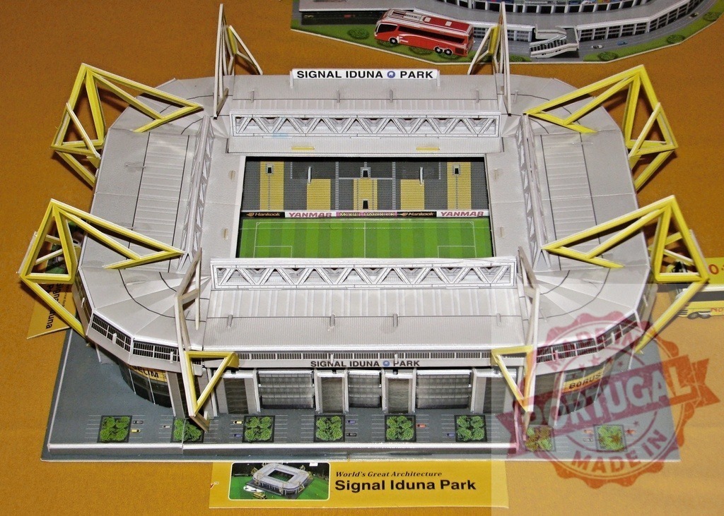 Scale model of Signal Iduna Park, home of Borussia Dortmund, showcasing intricate details | Detailed scale model of Signal Iduna Park football stadium, home of Borussia Dortmund, highlighting its unique architecture and vibrant yellow pylons - Realisiert mit Pictrs.com