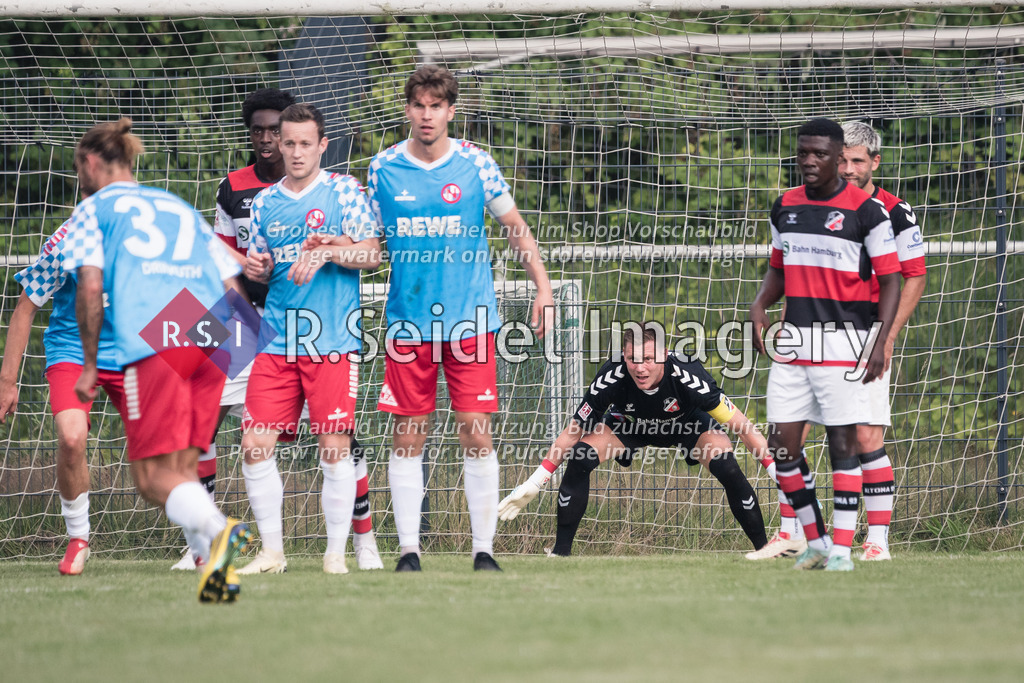 RS-1-127214 | Dennis Lohmann (#1, AFC, Torwart) beobachtet hinten im Tor den Ball beim Freistoß