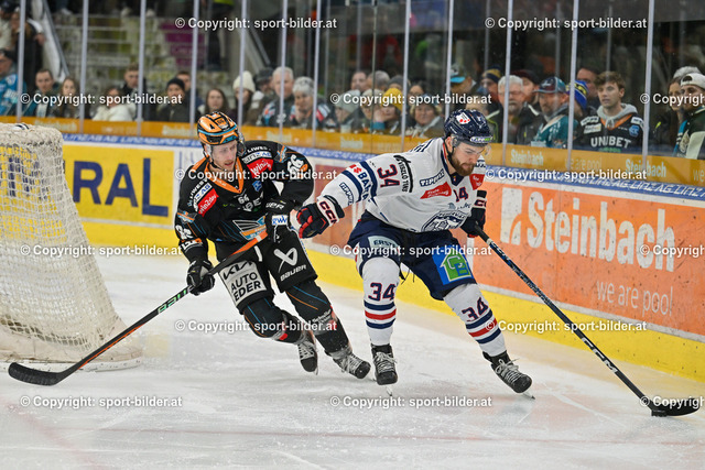 AUT, ICE, Black Wings Linz (AUT) vs Fehervar AV 19 (HUN) | 26.02.2023, Eishalle Linz, AUT, ICE Eishockey Liga, Black Wings Linz (AUT) vs Fehervar AV 19 (HUN), im Bild Stefan Gaffal (BWL) vs Istvan Terbocs (Fehervar)


// ICE win2day Hockey League Match between Black Wings Linz (AUT) vs Fehervar AV 19 (HUN) in Linz, Austria on 2023/02/26