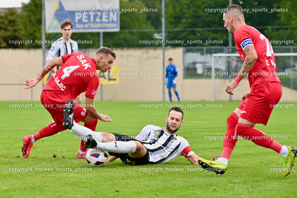 SVG Bleiburg vs. SAK 23.9.2023 | #4 Marko Gajic SAK, #9 Adnan Besic (K) SVG Bleiburg, #24 Zoran Vukovic (K) SAK, SVG Bleiburg vs. SAK 23.9.2023, SVG Bleiburg vs. SAK am 23.09.2023 in Bleiburg (Karl Kornberger Stadion), Austria, (Photo by Bernd Stefan)