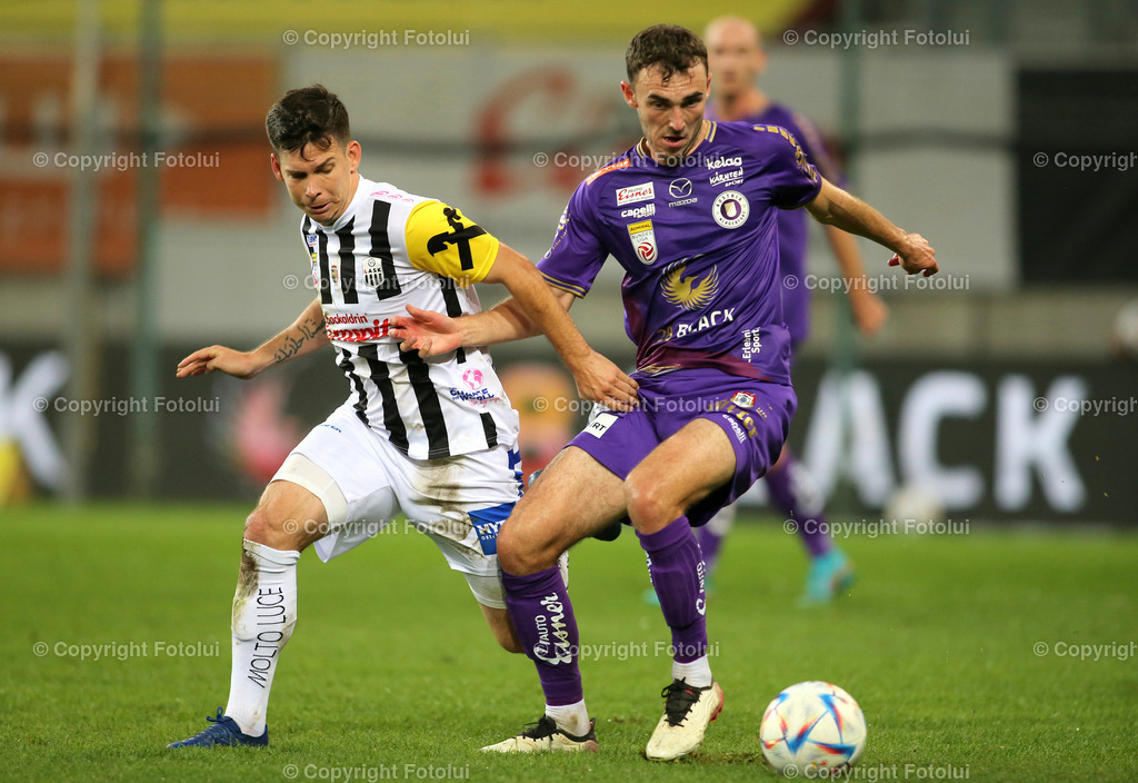 A_LUI_151022_10 | SPORT,FUSSBALL,TIPICO BUNDESLIGA AUSTRIA KLAGENFURT-LASK 15.10.20022 IM BILD :ANDREW IRVING(KLAGENFURT) UND PETER MICHORL (LASK) FOTO:FOTOLUI/MARIOWIMMER