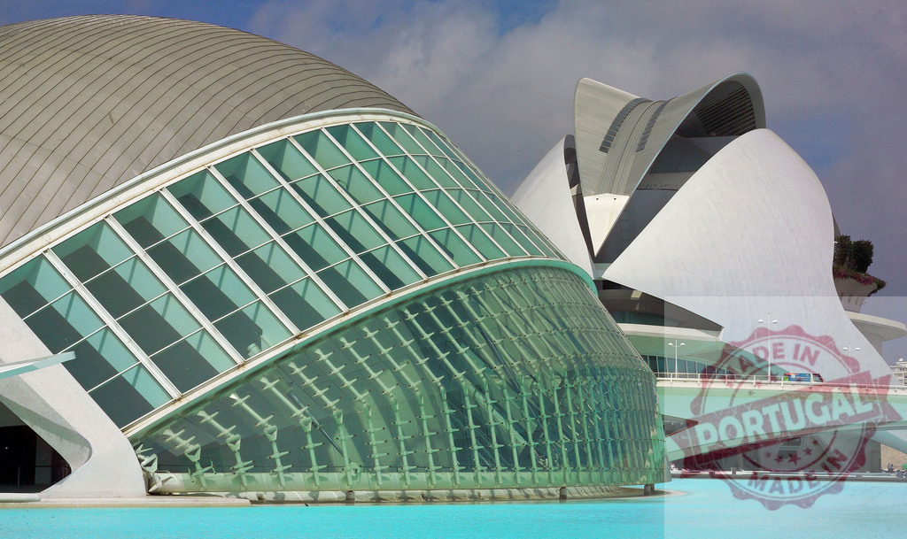 City of Arts and Sciences reflecting in water on sunny day in Valencia | Futuristic buildings of City of Arts and Sciences reflecting in turquoise water on sunny day in Valencia, Spain - Realized with Pictrs.com