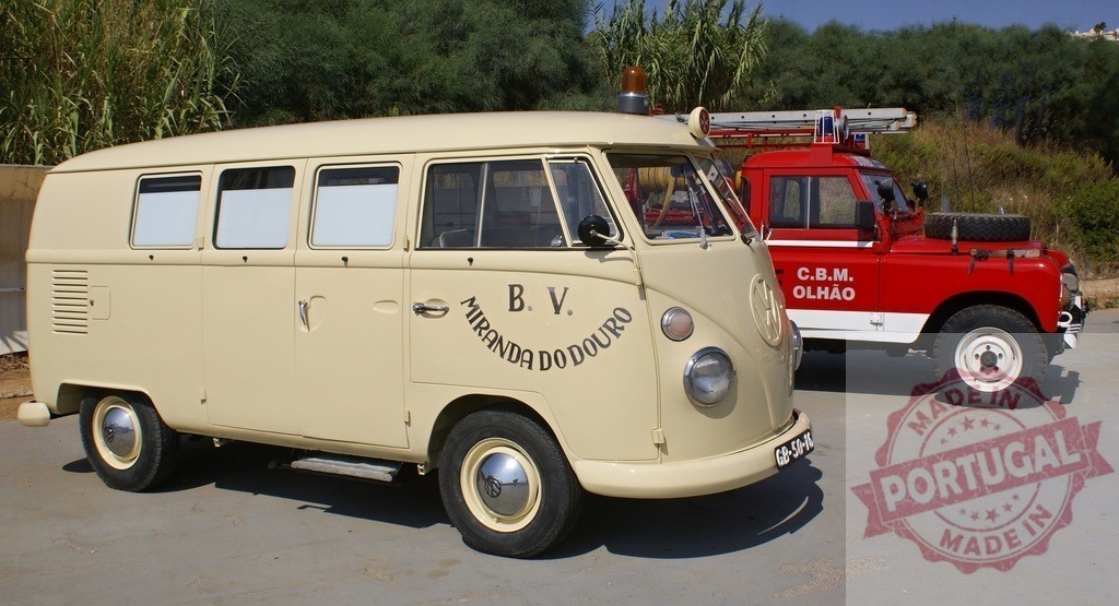 Volkswagen Type 2 bus and Land Rover fire truck | Vintage ambulance and fire rescue vehicles parked outdoors in Portugal - Realized with Pictrs.com